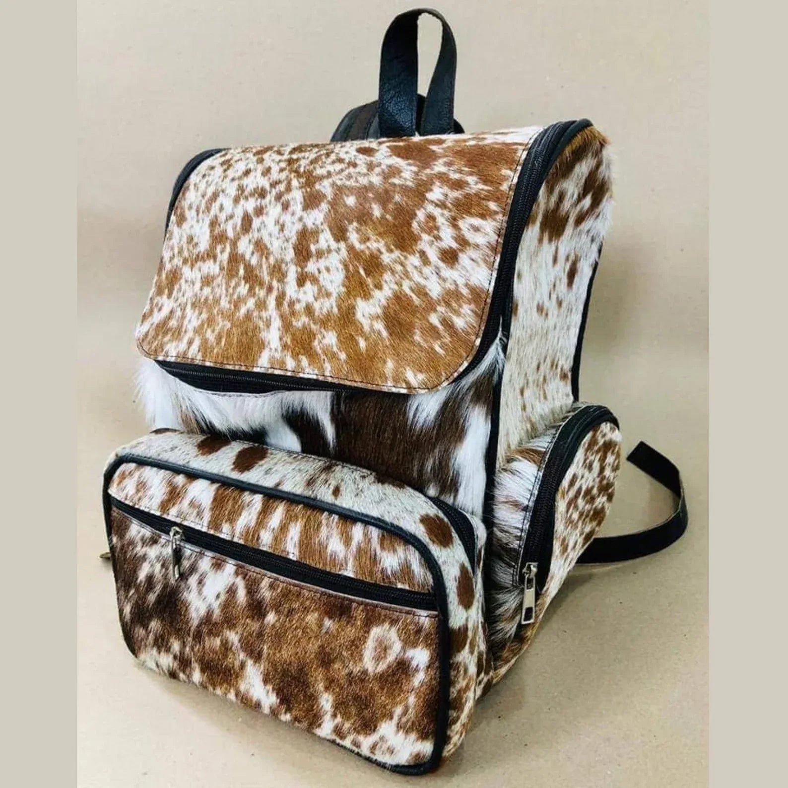 cowhide backpack speckled brown white leather backpack purse