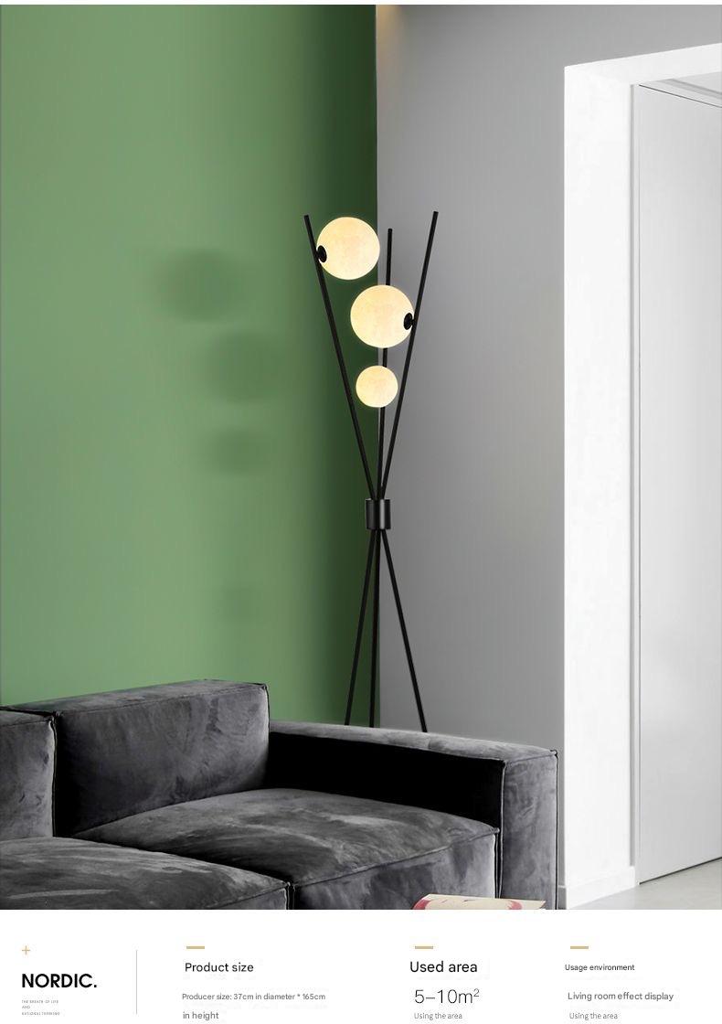 Nordic tripod moon globe floor lamp warm ambient lighting