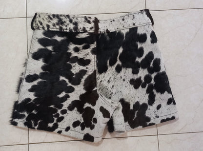 Shop men cowhide leather shorts and cow fur shorts for women in tricolor hide. Real hair-on cowhide with deep pockets and raw texture. 