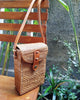 Rattan bag with leather crossbody handle