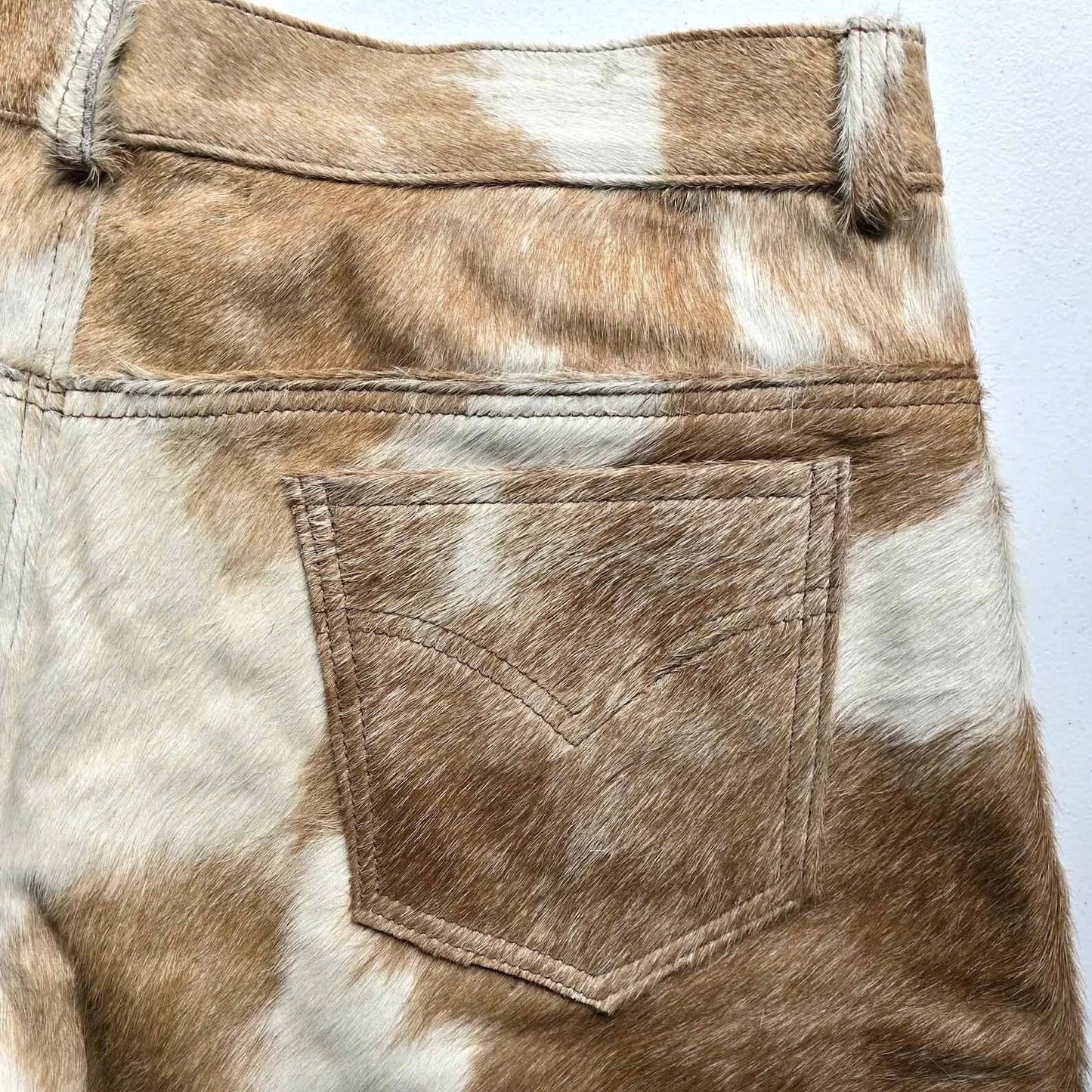 Genuine men cow hide short with rich hair-on hide texture, showcasing raw western vibes and unique patterning no factory material can match.