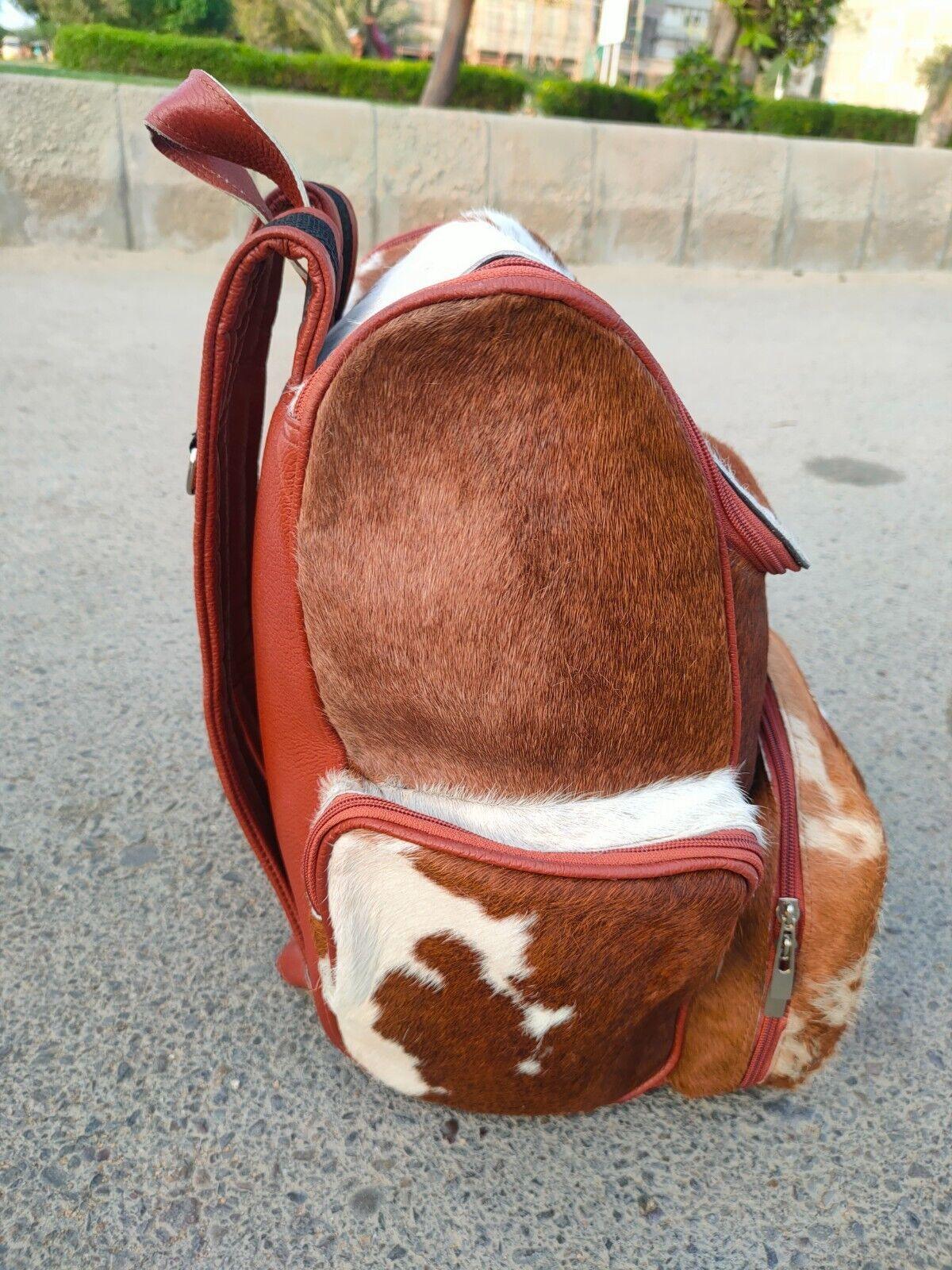 cowhide travel backpack brown white leather bag