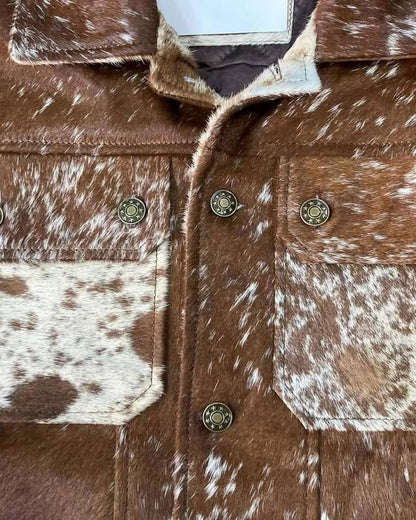 Explore the bold appeal of a full grain cowhide leather jacket in brown and white. This real cowhide jacket mens and women's design pairs rugged tradition with modern Western fashion.
