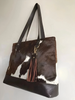 Brown white cowhide bag with fringe tassel