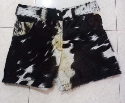 Order custom hair on cow hide shorts for men and women. These cowhide shorts feature bold fur texture in black, brown, and white cow patterns. Unique and made to order.