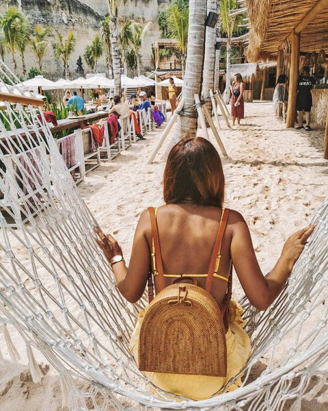 Discover the essence of Bali with our rattan backpacks—handwoven by local artisans and infused with the tropical scent of coconut. Your perfect travel companion awaits.