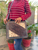 cowhide tooled leather sling bag