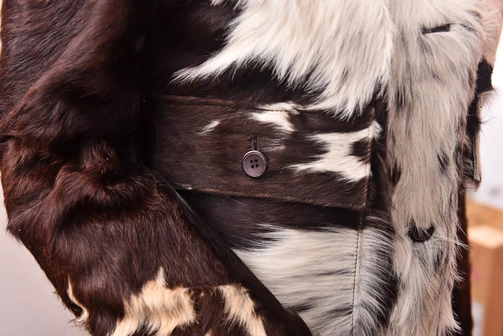 Western cowhide fur jacket with authentic cow print for women. Each cowhide coat is handcrafted and completely unique.

