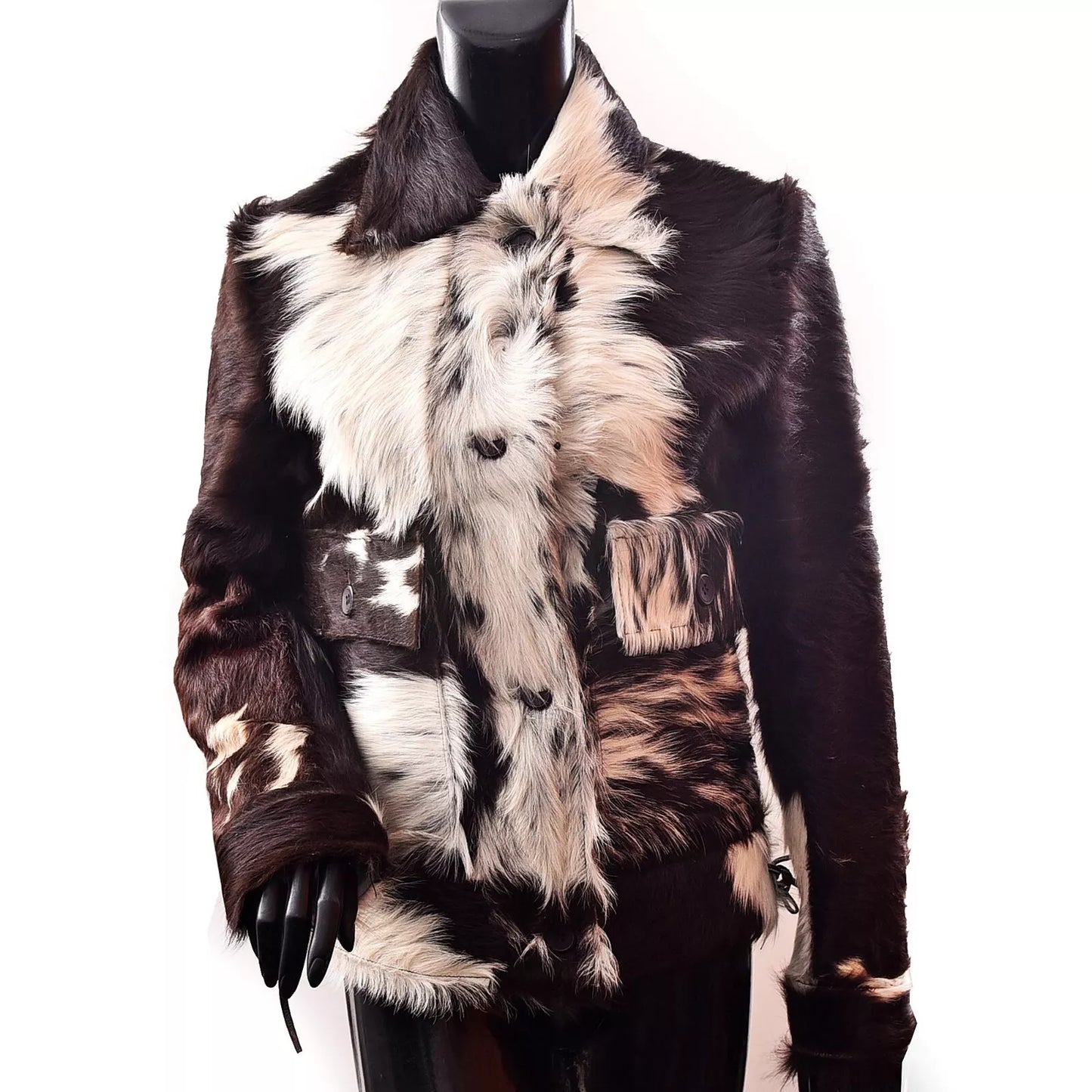 Real cowhide hair-on-hide jacket for women with button closure and natural fur. Standout cowhide coat in classic western style.

