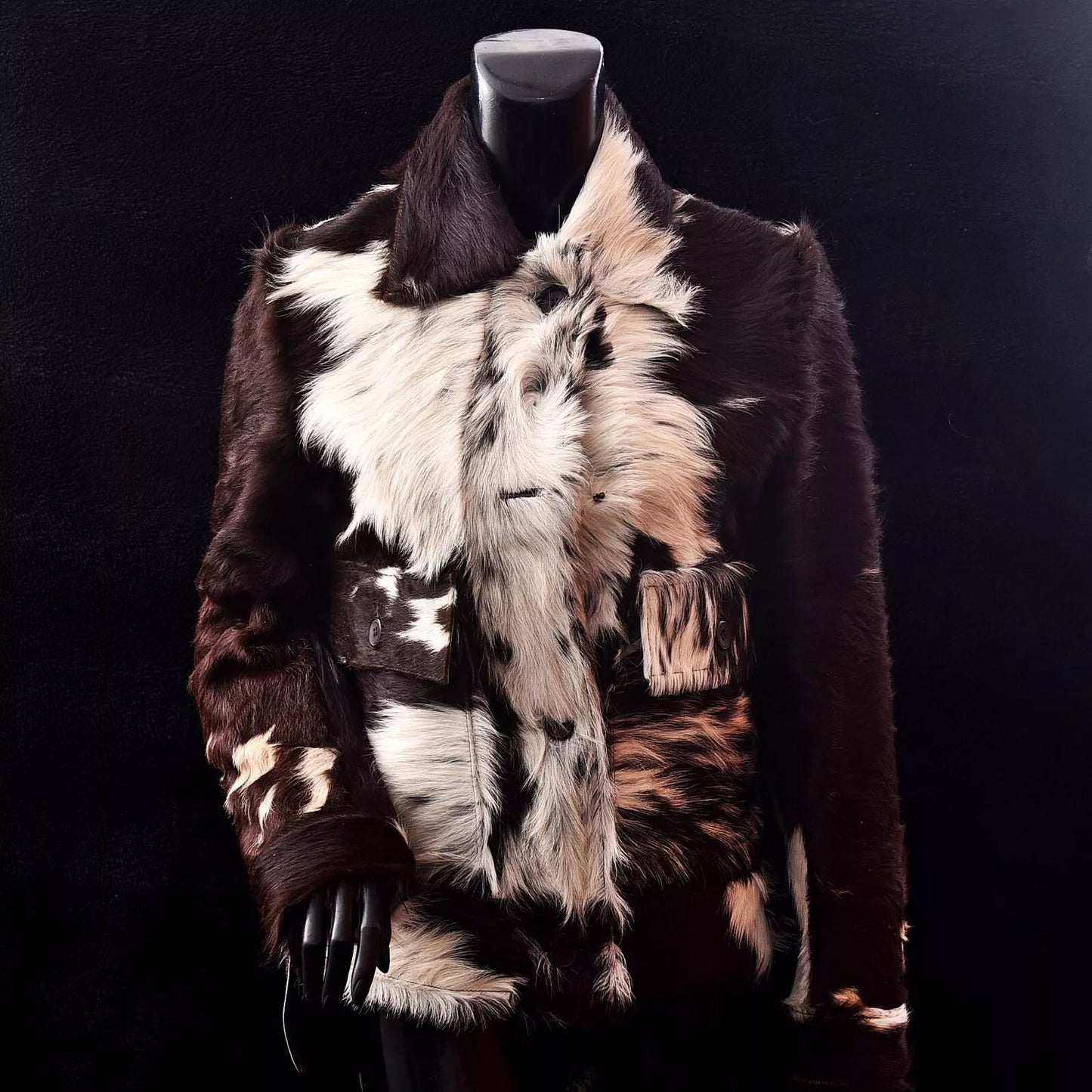 Women’s cowhide jacket with real hair-on cow skin in tricolor tones. Western-inspired coat made for bold cold-weather fashion.

