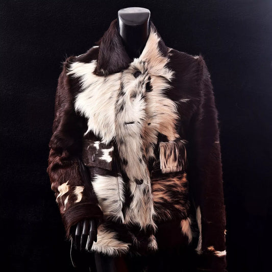 Women’s cowhide jacket with real hair-on cow skin in tricolor tones. Western-inspired coat made for bold cold-weather fashion.

