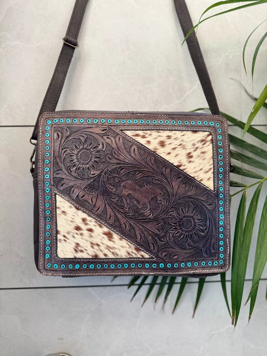 cowhide tooled leather sling bag