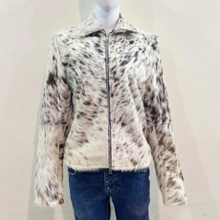 Stand out in a real speckled cowhide jacket for men. This hair-on-hide cowskin jacket blends rugged texture with bold cow print pattern.

