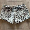 Black and white cowhide shorts for women featuring real hair-on-hide leather. Western-ready design made to stand out at any event.
