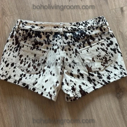 Black and white cowhide shorts for women featuring real hair-on-hide leather. Western-ready design made to stand out at any event.

