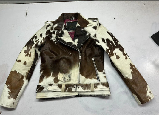 Authentic tricolor cowhide jacket for men with real fur, natural hide pattern, biker zipper design, and waist belt. Bold Western cowhide coat for statement wear.

