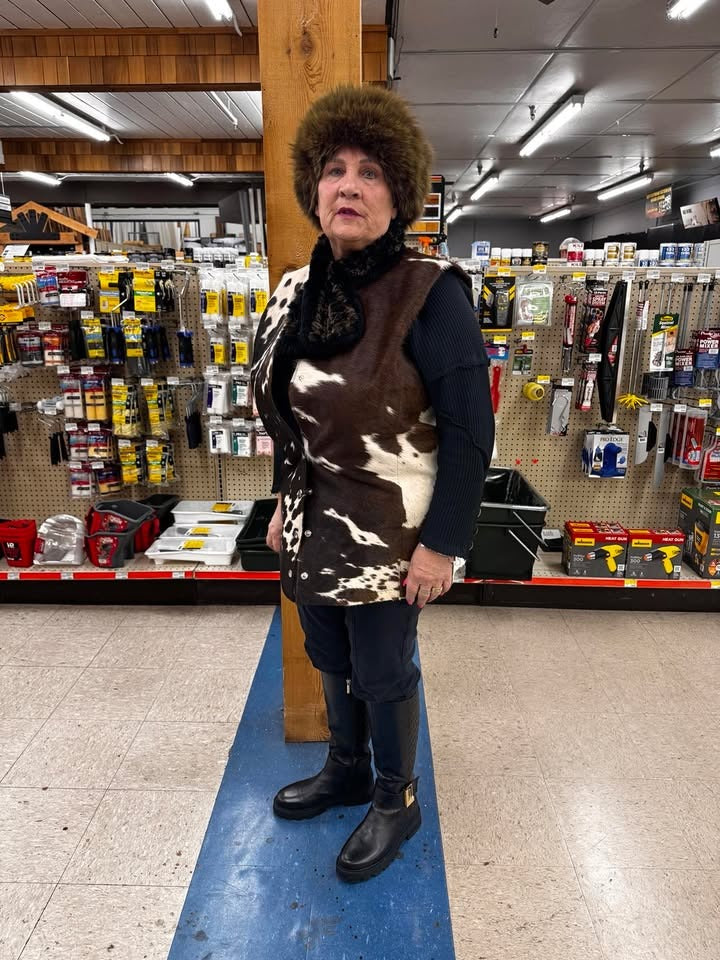 Tricolor cow coat for women featuring natural cowhide texture and no sleeves. This cow fur vest brings ranch attitude to everyday outfits.

