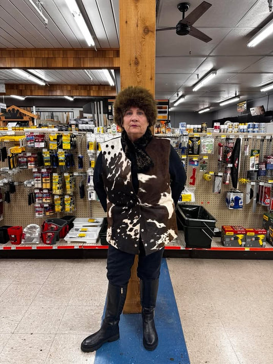 Hair on cow hide coats for women with custom sizing. This sleeveless cowhide vest is designed for comfort, layering, and standout western style.

