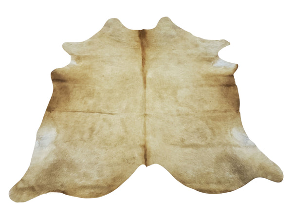 A beautiful beige chamapagne cowhide rug that will bring neutral colots to any space of your home, it is thick and heavy and it will last long.