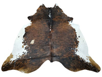 If you're looking for a cowhide rug that will make a statement, then look no further than one with a dark tricolor cowhide rug for sale, its soft and smooth.