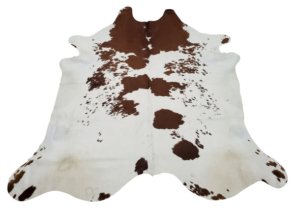 A cowhide rug that you will love for your bedroom and colors are real and natural, a mix of salt and pepper brown white, very soft and smooth.