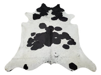 This black white cowhide rug is beautiful and can be a great fit for any home, matches any couch and wall art, is very soft on feet and is genuine. 