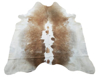 Hand picked rustic cowhide rug for any space, free shipping all over, these cowhides are unique in pattern. Over hundred shades of cow skin rugs in stock.