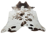 Spotted grey white cowhide rugs have proven themselves to be the main decorating element in any classic home from modern rustic or simple yet elegant