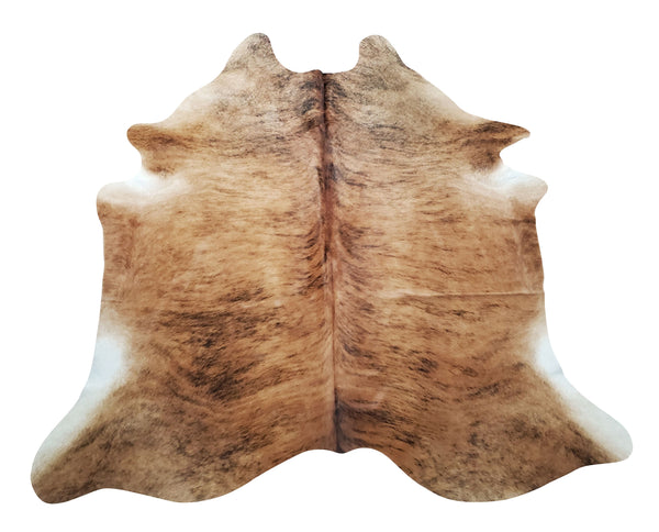If your room is boring, a brown brindle cowhide rug is a good reason to decorate a room with this stunning natural hide. 