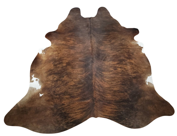 This genuine cowhide rug in brindle tricolor is of amazing quality, so soft and smooth. These are great for modern hallways or even hanging on walls. 