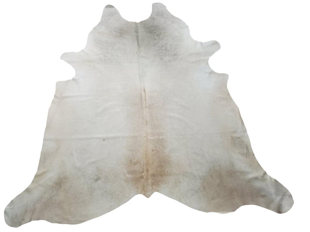 This real and genuine cowhide rug in a beautiful beige light grey is available to adorn your interior from the living room to the kid's room.