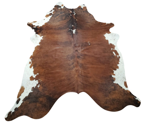 Are you planning to purchase a new cowhide rug for your master bedroom, this one is a stunning mix of chocolate brown, real, natural and free shipping