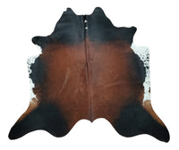The Brown and white cowhide rug is very cute, the pattern and shade are mild, very soft, and smooth. These are a hundred percent genuine and free shipping.