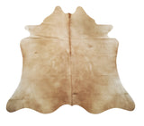 This light beige brown cowhide rug will give a mix of a contemporary and modern touch, it is free shipping all over the USA, natural and real .