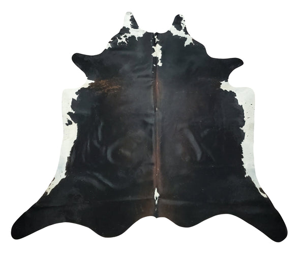 This mini cowhide rug will make anyone extremely happy, it will be a beautiful addition to any home office or western decor. Beautiful mini cowhide rug that will give a love ranchy touch to your western home, super fast shipping and lovely symmetry.