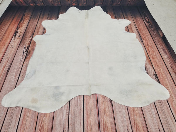If you're looking for a natural and durable rug for your home or office, consider a white cowhide rug. These rugs are great for hallways or offices and can add a touch of luxury to any space.