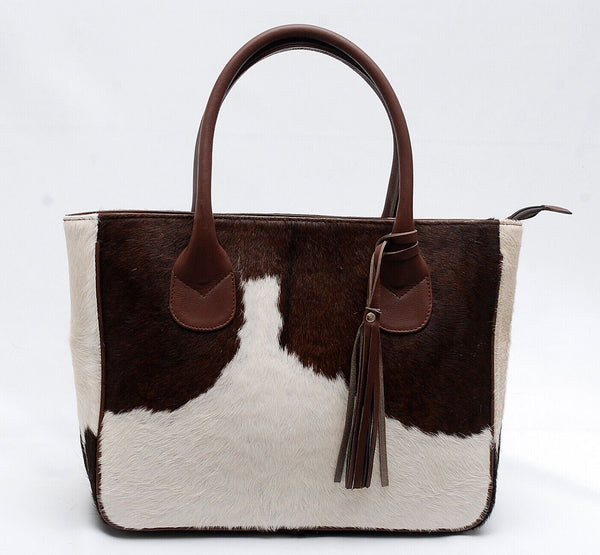 Exotic cowhide tote bags are the perfect accessory, whether you're shopping, running errands or going to work, these stylish and functional bags are the perfect choice. 