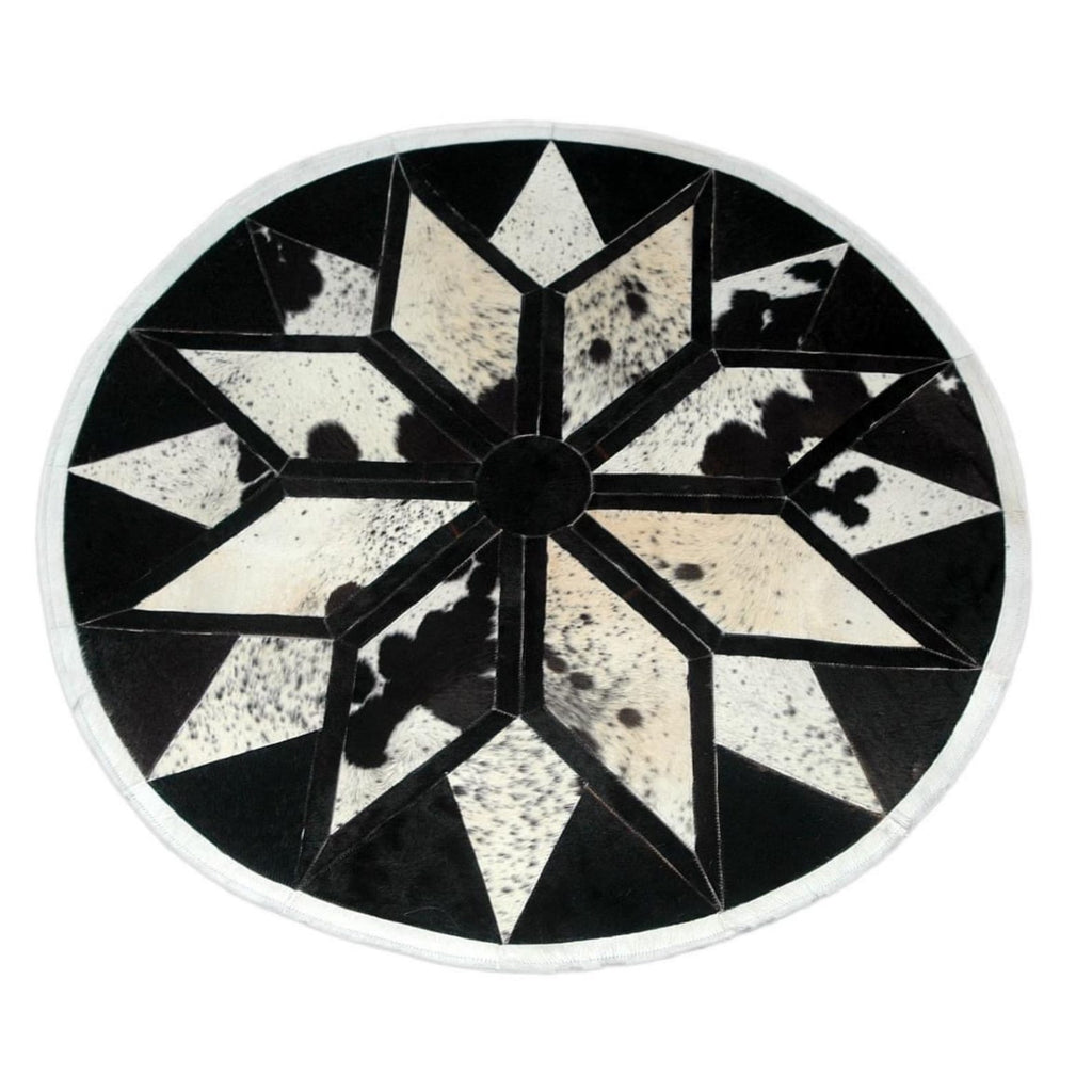 Discover the perfect addition to your decor: a unique cowhide patchwork rug! Ideal for any interior design project, entryway, or as a statement piece under a farmhouse table.