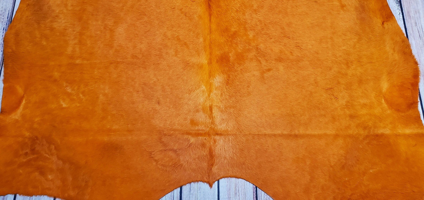 Exotic Dyed Orange Cowhide Rug 90 X 82 Inches