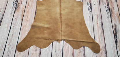 Looking for a new addition to your home that will make it feel cozier than ever? Check out this beautiful beige brown cowhide rug!