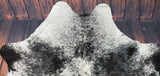 This black and white cowhide rug is absolutely lovely and the texture and colors in it bring to mind the exotic style.