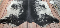 A cowhide rug with a fashionable pattern, cutting-edge style, or traditional black-and-white coloring is a perfect choice for a modernist household, a rustic ranch, or even a farmhouse.