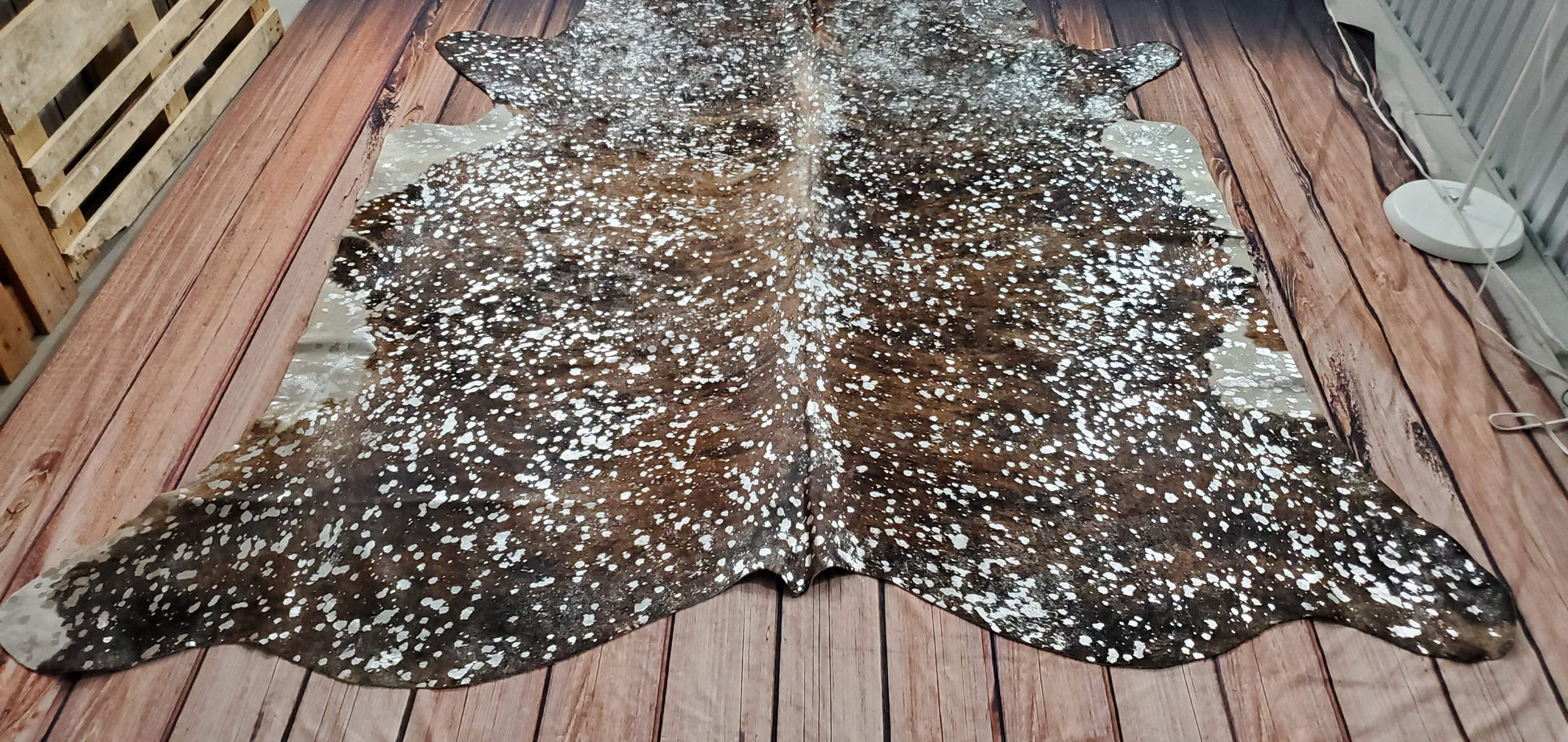 This metallic cowhide rug is stunningly beautiful, it's even more amazing in person, you'll be lost in all the tiny intricate circles, very tender and soft.
