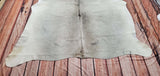 The cowhide rug is attractive but matches any farmhouse, It fits well on any oak floor.