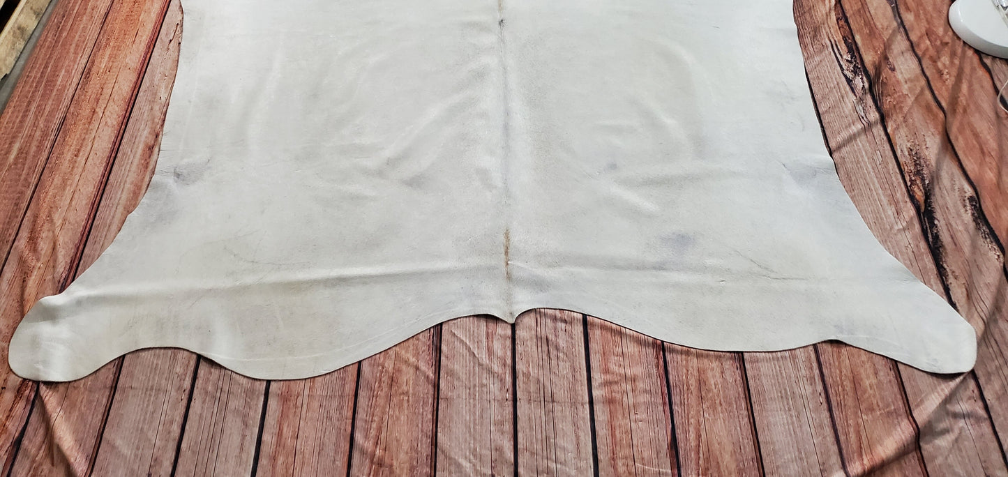 This cowhide rug has a fine texture and would likely compliment a range of room settings. These soft and supple rugs are especially easy to walk upon.