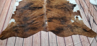 This small cowhide rug is an exquisite enhancement for the home office.