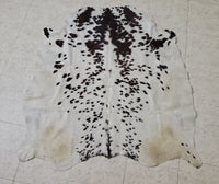 A luxurious extra small cowhide rug, add to your boho living room, it will give a touch of western decor, comes with natural stamps or branding marks 