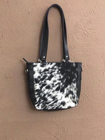 black and white real cow hide messenger bag