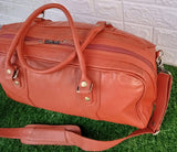 Pumpkin Orange Leather Weekender Bag