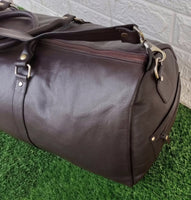If you're looking for the perfect travel companion for long routes, look no further than the dark leather holdall bag.